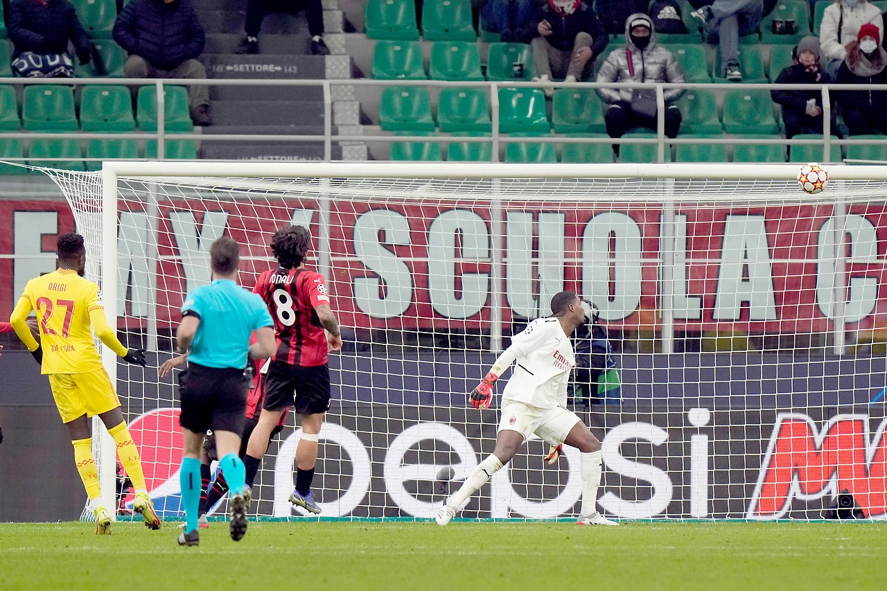 Liverpool's Divock Origi scores against AC Milan