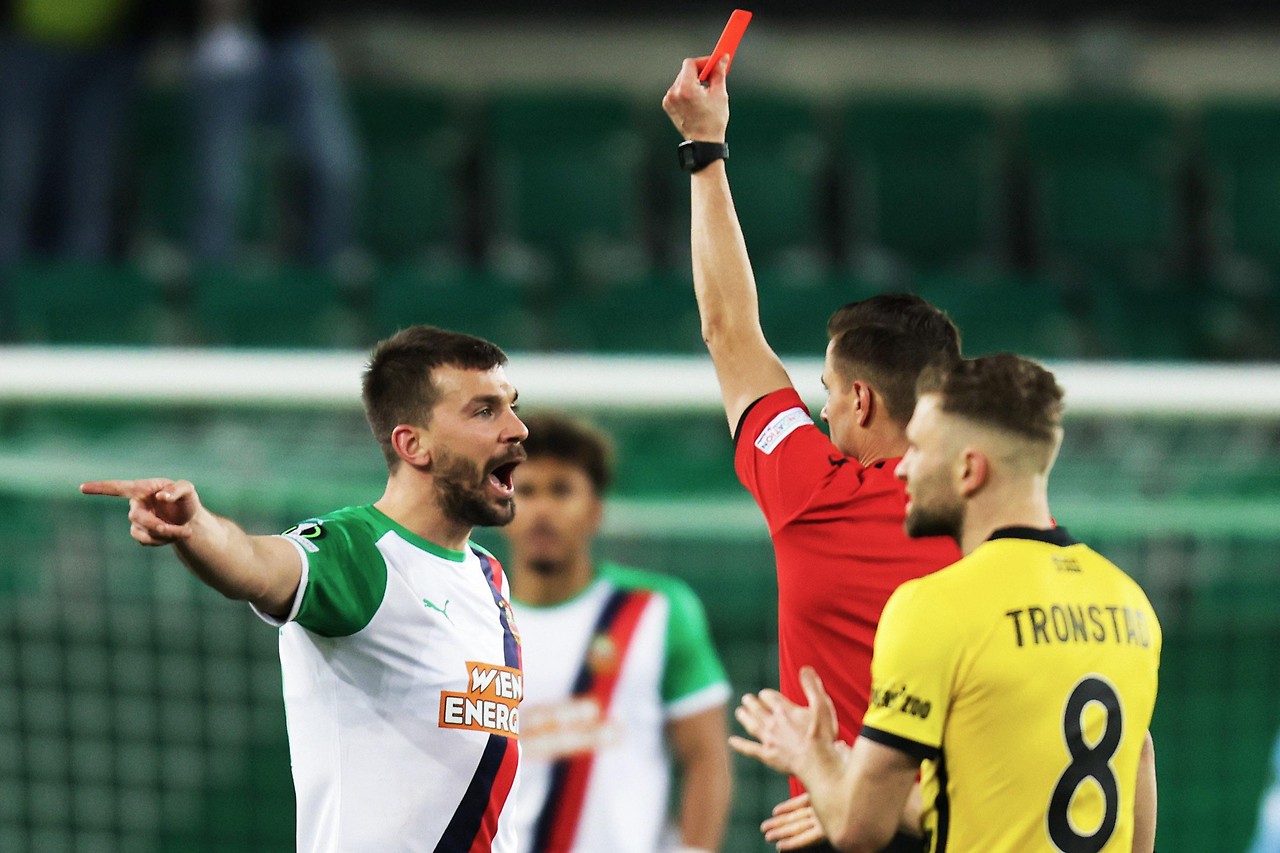Filip Stojkovic (quick) shows the red card