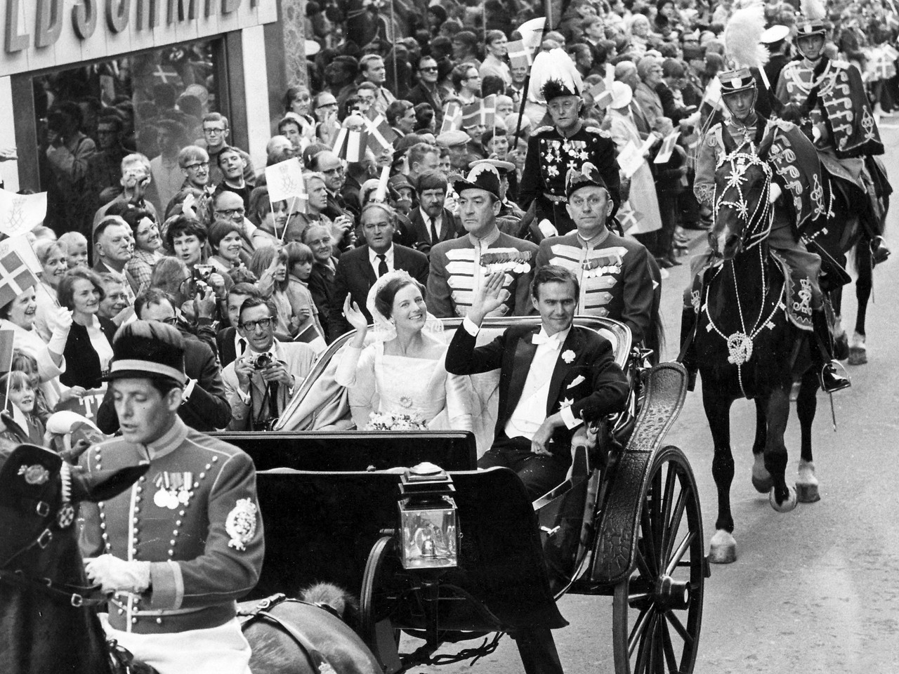 Danish Queen Margrethe and her husband in a carriage after their wedding, 1967